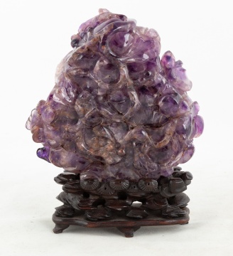 Chinese Carved Amethyst "Thousand Faces"